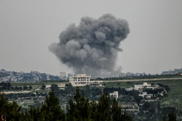 Smoke rises from targeted areas in the town of Choukîne, in Lebanon Nabatieh province following an airstrike