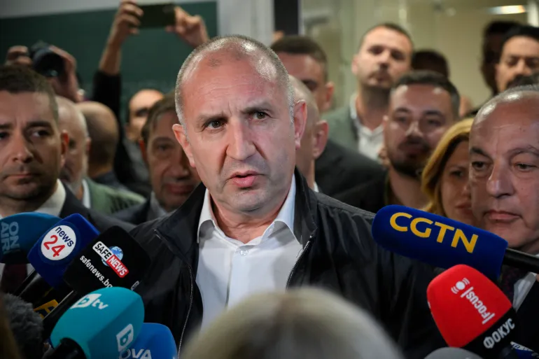 "Progressive Bulgaria" coalition's leader and former President Rumen Radev speaks to the press at his party headquarters after polls closed in Bulgaria's parliamentary elections in Sofia on April 19, 2026.