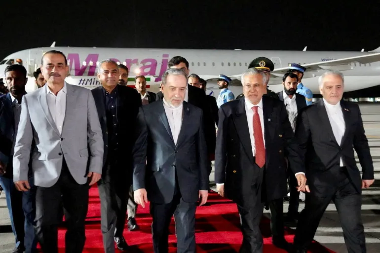 Pakistan's Foreign Minister Mohammad Ishaq Dar and Army Chief, Field Marshal Asim Munir welcome Iranian Foreign Minister Abbas Araqchi upon his arrival, in Rawalpindi, Pakistan, released April 25, 2026. SEYED ABBAS ARAGHCHI VIA TELEGRAM/Handout via REUTERS THIS IMAGE HAS BEEN SUPPLIED BY A THIRD PARTY. NO RESALES. NO ARCHIVES. MANDATORY CREDIT Verification Lines: -Date not verified -Location matched footage from the Nur Khan airbase in Rawalpindi -No older versions of the photo were found posted before April 25 -Iranian Foreign Minister Abbas Araqchi met Pakistani Foreign Minister Ishaq Dar at the Serena Hotel, where the first round of talks with the U.S. was held, sources said REFILE - CORRECTING LOCATION FROM "GIVEN AS ISLAMABAD" TO "RAWALPINDI" AND VERIFICATION LINES
