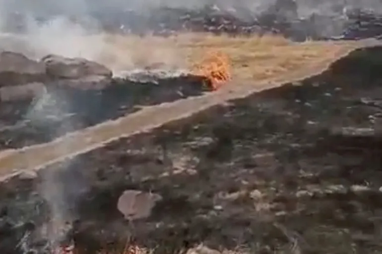 Smoke rises amid burned areas at a military base in Hombori, Mali, in this still image obtained from an undated social media video released April 30, 2026. Al Qaeda affiliate Jama'at Nusrat al-Islam wal-Muslimin (JNIM) said on Thursday it had captured the military base of Hombori. Social media via REUTERS THIS IMAGE HAS BEEN SUPPLIED BY A THIRD PARTY. NO RESALES. NO ARCHIVES. NEWS USE ONLY VERIFICATION: Reuters verified the location from the gates, buildings, barrier and mountains seen in the video, which matched archive and satellite imagery from the area. Location of barracks: 15.2683393634622, -1.7728507348021563. The date when the video was recorded could not be verified, but no older versions of the video were found posted online before April 30. Rebel group JNIM also made a statement on April 30 claiming control of the Hombori military barracks seen in the video. Corroborating video was also posted on April 30 showing the same scene and mountains.