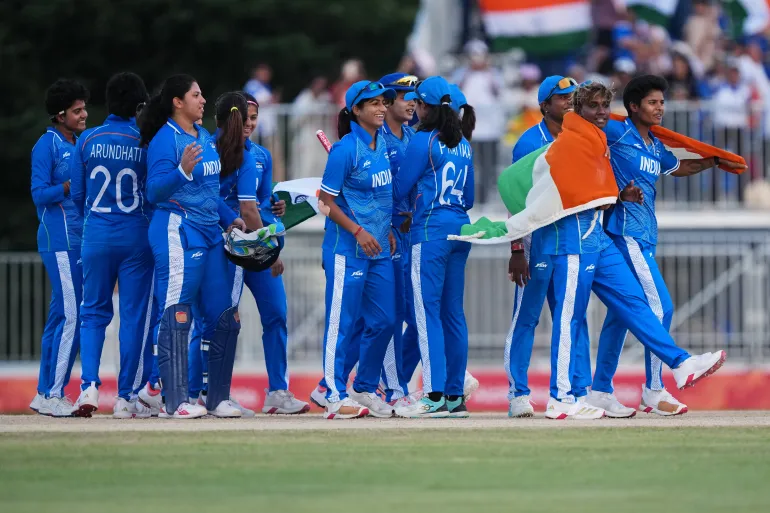 Indian players celebrate after winning the women's gold medal T20 cricket game between India and Sri Lanka at the Asian Games in Nisshin, Japan, Tuesday, Sept. 22, 2026. (AP Photo/Mark Baker)