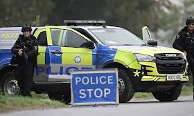 Bomb squad searches vans near UK air base as five men arrested for terrorism Bomb squad searches vans near UK air base as five men arrested for terrorism